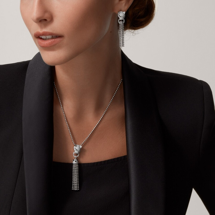 panthère de cartier ohrringe halb gepflastert